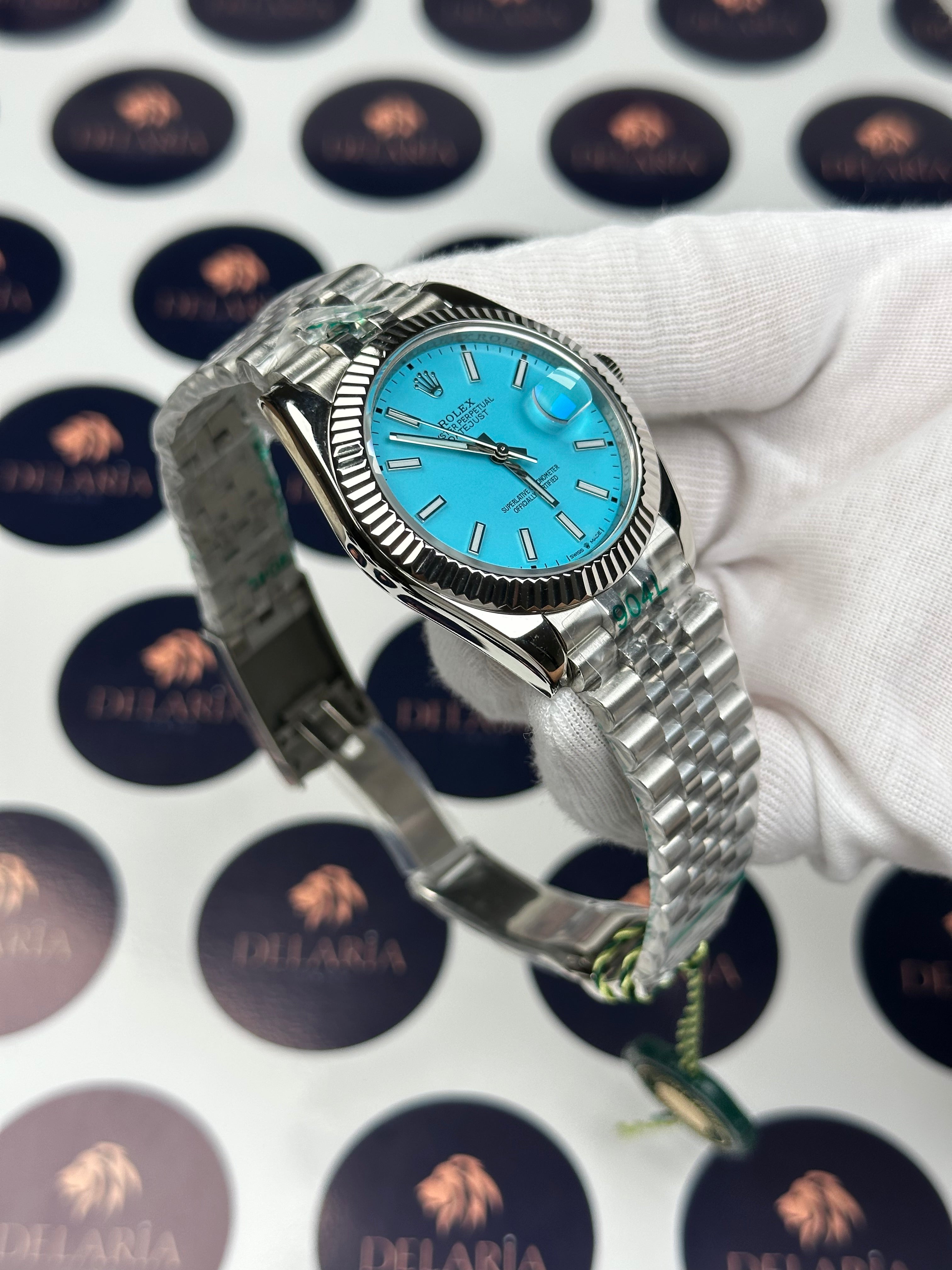 ROLEX DATEJUST 41 MM TURQUOISE DIAL SILVER JUBILE