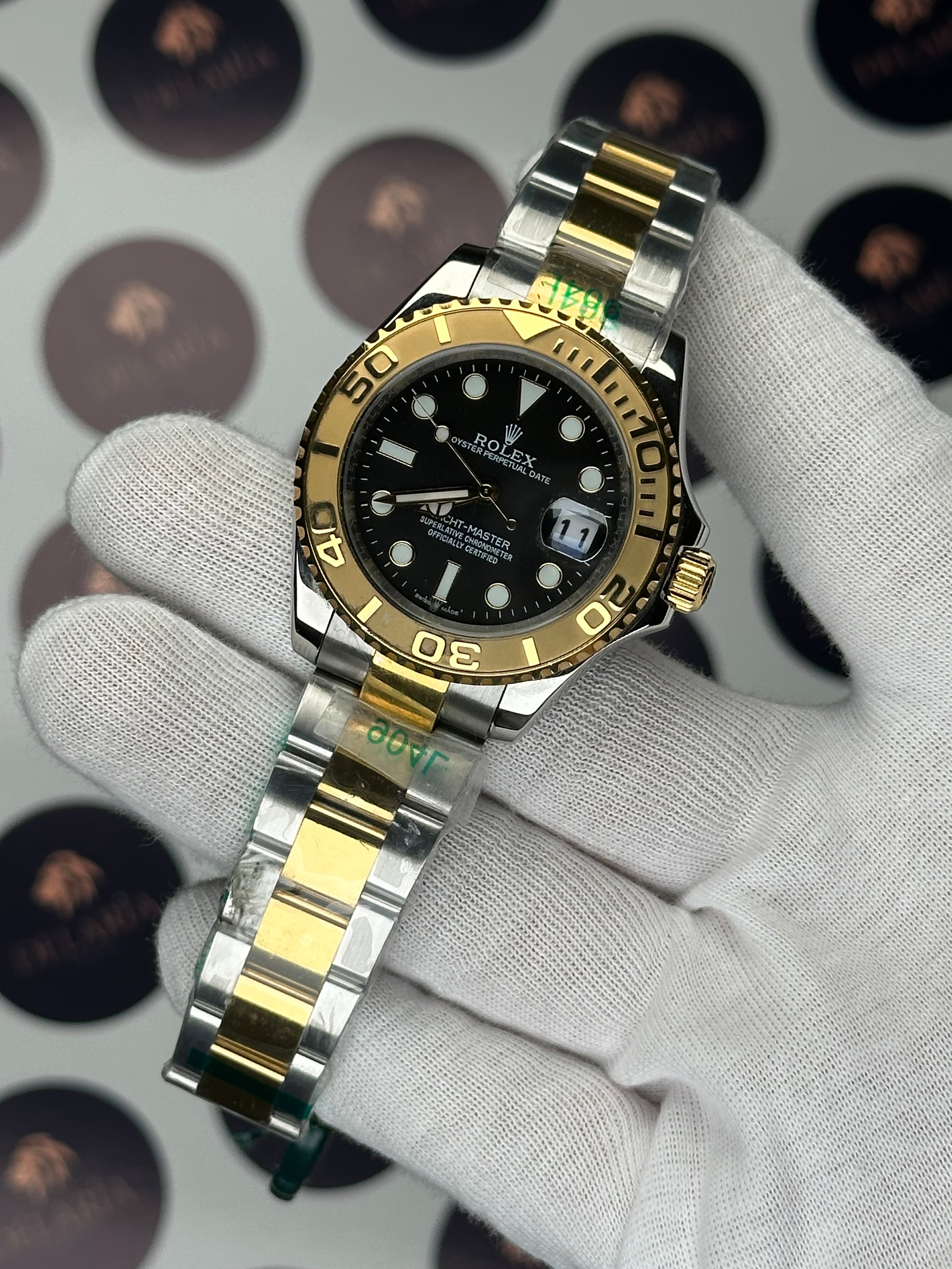 ROLEX YATCH-MASTER 42 MM BLACK DIAL GOLD-SILVER OYSTER